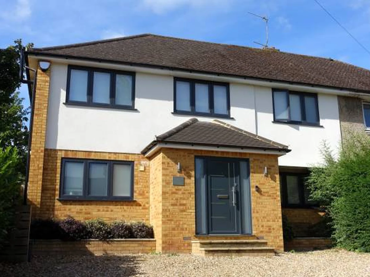 Exterior painting of modern semi-detached house by Hampstead Decorators Fortune Green painters