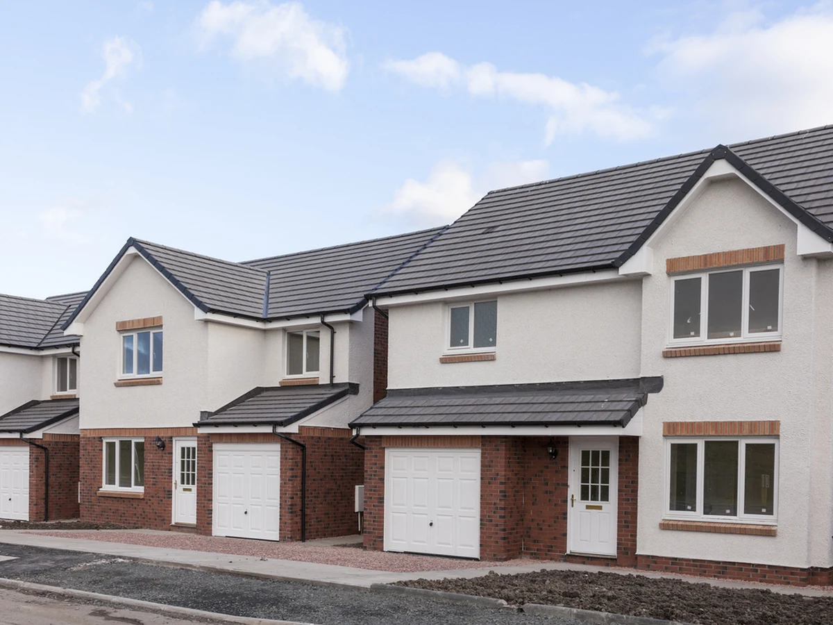 Row of white rendered houses with fresh masonry paint in Hampstead