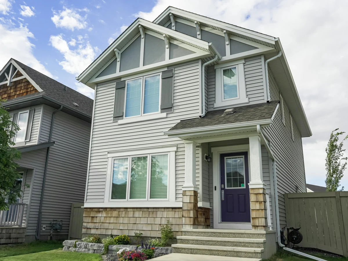 Exterior painting of suburban semi-detached house by Hampstead Decorators in Fortune Green NW6