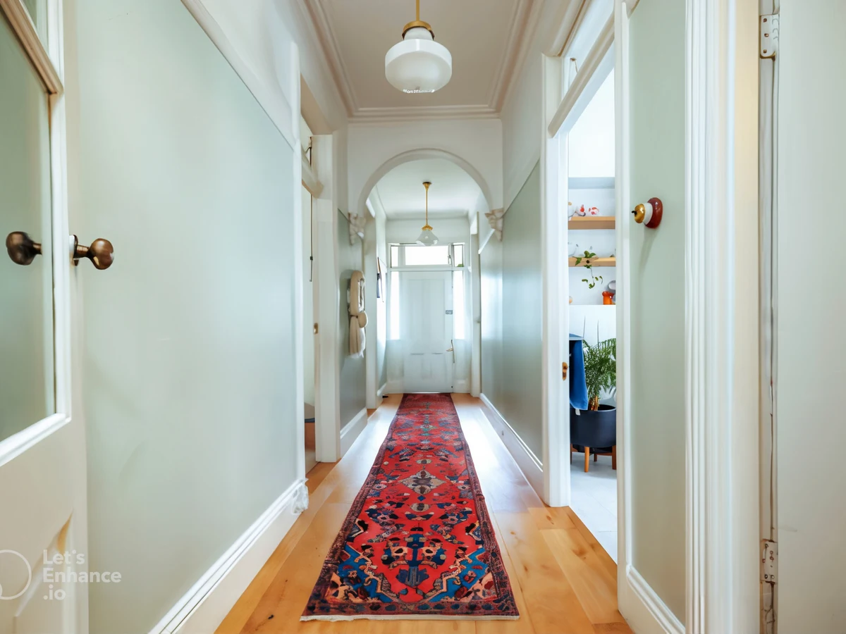 Edwardian hallway with sage tones in Hampstead, period property decorating by Hampstead Decorators