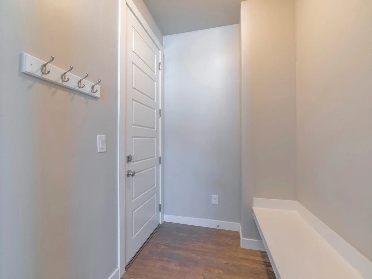 Hallway painting in Hampstead by Hampstead Decorators, simple grey hallway with clean walls